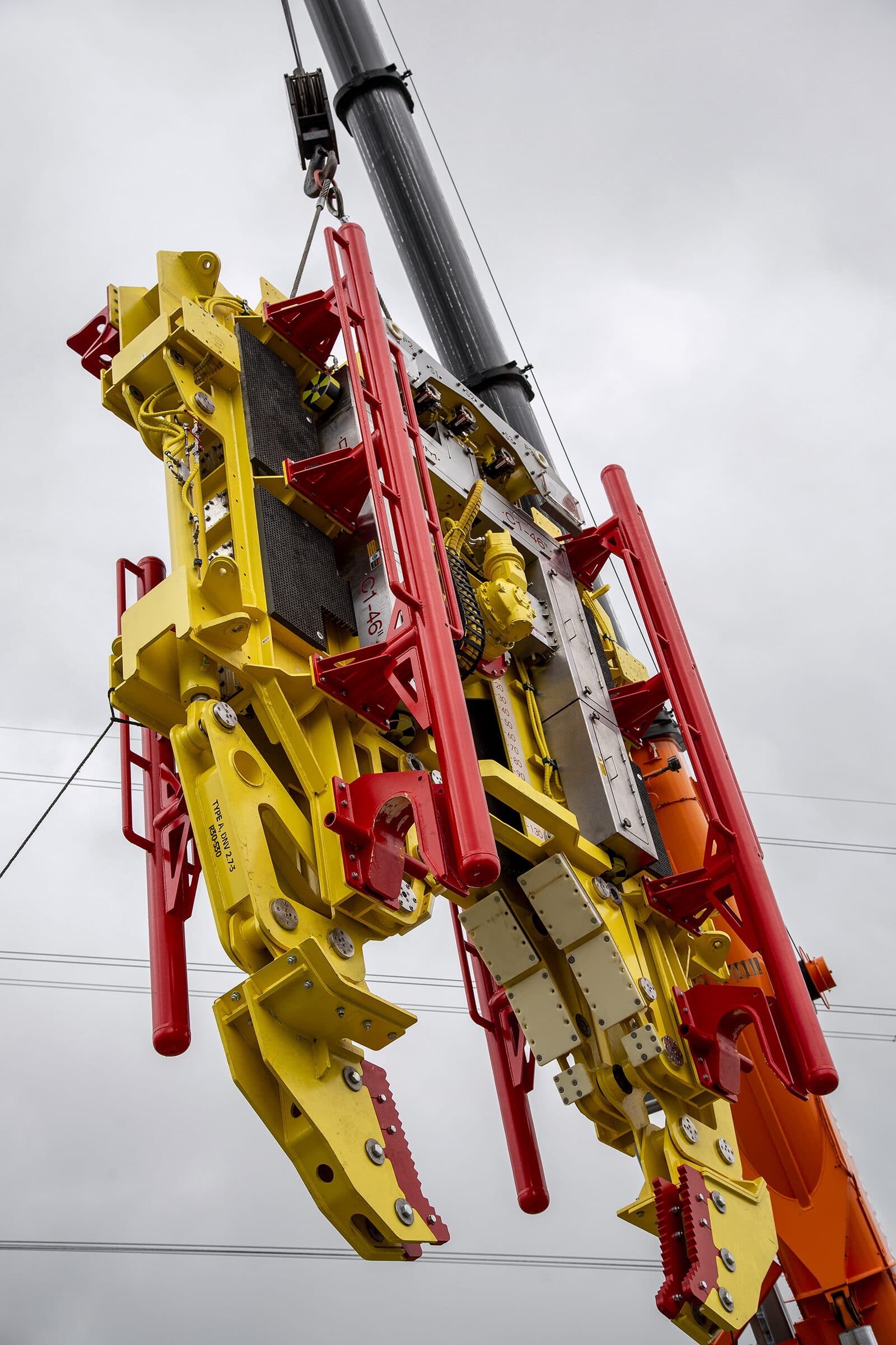 C1-46 suspended from crane, low angle view
